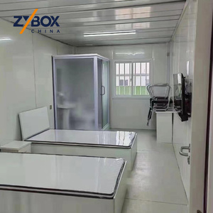 Maison conteneur extensible <span class=keywords><strong>de</strong></span> 40 pieds à toit à pignon, avec porche en treillis d'acier blanc et terrasse marron, Villa modulaire préfabriquée <span class=keywords><strong>de</strong></span> luxe AU - Product Image 4