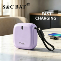 Batterie externe 10000mAh avec câble intégré, charge rapide PD 22.5W, powerbank portable avec support de téléphone pour les voyages