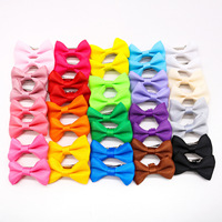 Jolie pince à cheveux pour animaux de compagnie en polyester couleur unie avec nœud, accessoires et décorations pour chiens en gros