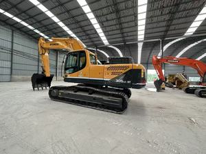 Excavatrice sur chenilles d'occasion Hyundai 305LC-9T, machine de terrassement jaune avec godet - Product Image 2