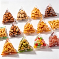 Machine d'emballage de granulés pour snacks, sachets de thé triangulaires, film en rouleau de tissu non tissé en maille de nylon, machine d'emballage de sacs