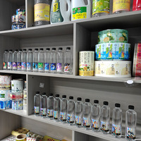 Étiquettes rétractables personnalisées pour bouteilles d'eau Étiquettes imperméables en PVC pour bouteilles d'eau minérale disponibles en pièces ou en rouleaux