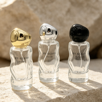 Flacon de parfum en verre sculpté unique de 50 ml, transparent, avec bouchon en métal noir, or, argent, atomiseur de parfum unisexe