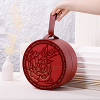 Vente en gros personnalisée boîte d'emballage de cadeau de luxe unique au design moderne pour bonbons chocolat pour mariage avec poignées en PU