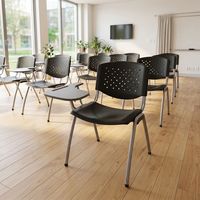 Chaise d'étude en plastique noire avec dossier moulé, pieds en tube d'acier et tablette d'écriture intégrée pour étudiants en classe