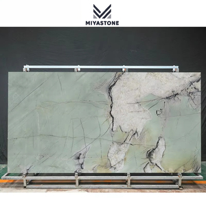 MIYA STONE Book Match Texture Piedra sinterizada de jade verde para interiores y exteriores - Product Image 1