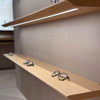 Étagères flottantes en bois de noyer véritable avec éclairage LED pour l'affichage de lunettes haut de gamme dans les cliniques ophtalmologiques, fabriquées sur mesure (longueur, profondeur, épaisseur)