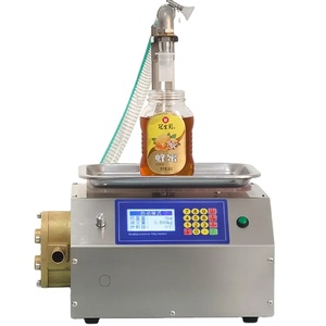 Machine de remplissage semi-automatique pour petits flacons en plastique de shampoing, crème cosmétique, miel et huître, à haute viscosité, par pesage - Product Image 1