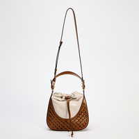 Nouveaux petits sacs à main en cuir végétalien pour femmes à la mode unique avec logo personnalisé Sacs seau de luxe avec cordon de serrage en paille pour dames