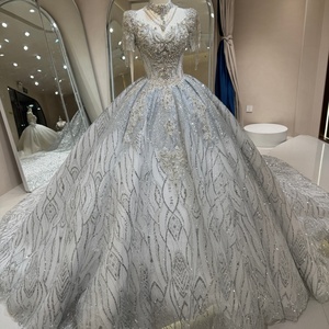 ชุดราตรีงาน Quinceanera สีเงินเทา รุ่น Dw0221 ดีไซน์ทันสมัย คอเสื้อแบบ Illusion ประดับลูกปัด ช่วงตัวเสื้อแบบคอร์เซ็ท แต่งลายใบไม้ระยิบระยับด้วยผ้าทูลล์ ทรงเมอร์เมดยาวลากพื้น - Product Image 1