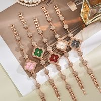 Montre à quartz trèfle à quatre feuilles à la mode classique avec bracelet en diamant pour femme