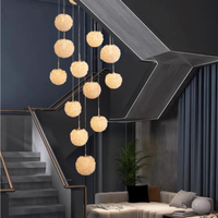 Lustres modernes en cristal à boules de litchi, suspensions longues à hauteur réglable pour escalier de villa
