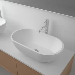 Oem özelleştirilmiş beyaz Oval akrilik cilalı reçine katı yüzey kabine gemi lavabo banyo lavabo tezgahı lavabo