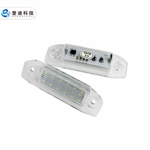 Luz LED para matrícula P2C-45, carcasa transparente, luz blanca, distancia entre orificios de 177 mm, tipo empotrado, para Volvo S80 40 60 V50 60 70 - Product Image 1