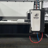 Machine de découpe laser à fibre CNC Tuosheng Industry avec table d'échange automatique et couvercle entièrement fermé pour la découpe de métaux