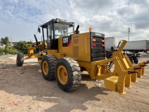 Б/у автогрейдер Caterpillar GC 140K (Япония, 2020 г.) в наличии, с отвалами - Product Image 2