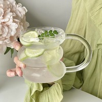 Venta al por mayor de fábrica: Taza de vidrio de borosilicato de 430 ml con asa, logotipo personalizado, apilable, transparente, para café y zumo, apta para microondas.