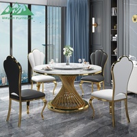 Ensemble de table à manger ronde de luxe Wayon en acier inoxydable, base en spirale dorée en forme de cage à oiseaux, bord en métal