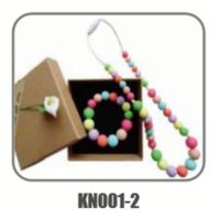 Collier à mâcher populaire en silicone pour enfants avec anneau de dentition sensoriel pour bébé