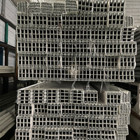 Profilés en aluminium personnalisés de la série 6000 du fabricant chinois Cintrage CNC des portes coulissantes en grain de bois pour la Jamaïque et la Dominique