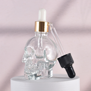 High Quality 50ml 1.5oz Exquisite <strong>Skull</strong> <strong>Glass</strong> <strong>Bottle</strong> With Gold Sliver Dropper for Personal Care - Product Image 2