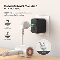 Adaptateur de Voyage Universel à Charge Rapide avec 2 Ports USB pour Ordinateur Portable Compatible US/EU/AU/UK