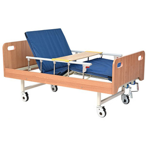 Lit d'hôpital manuel avec cadre en bois et manivelle en acier inoxydable, réglable pour usage domestique et médical - Product Image 1