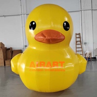Modèle de canard jaune gonflable géant personnalisé avec casque et lunettes de soleil pour décoration d'événements et d'expositions en centre commercial