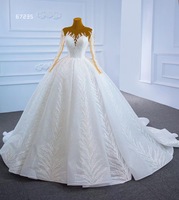 Robe de mariée de luxe Feishiluo à col rond, style moderne, coupe princesse, manches longues, ornée de perles, de paillettes et d'appliques brodées en dentelle