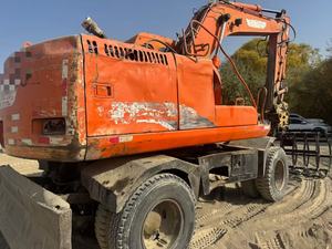 Excavatrice sur pneus Doosan DH150w-7 d'occasion, modèle 2021, 15 tonnes, bon état esthétique, moteur, boîte de vitesses, pompe, roulement – Prix avantageux - Product Image 2