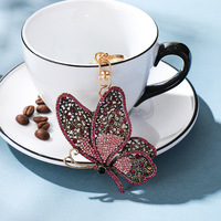 Porte-clés papillon ajouré incrusté de diamants, couleur tendance, cadeau créatif et exquis