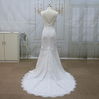 Robe de mariée moderne de luxe avec motif en dentelle et robe de plage joliment décorée d'appliques