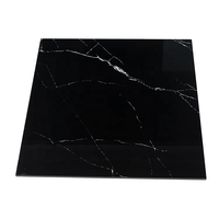 Carrelage en porcelaine aspect marbre noir poli, 60x60cm, carreaux de sol haute brillance pour salon et hall d'hôtel