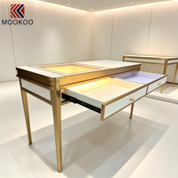 Comptoir de réception pour bijouterie, table de consultation de bijoux avec cadre doré, écran LED intégré, table de caisse pour bijoux