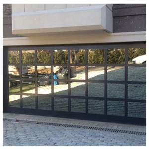 <span class=keywords><strong>Porte</strong></span> <span class=keywords><strong>de</strong></span> <span class=keywords><strong>garage</strong></span> en verre minimaliste Prima avec cadre en aluminium et panneaux transparents pour les devantures <span class=keywords><strong>de</strong></span> magasins et les cafés modernes - Product Image 1