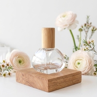 Flacon roll-on en verre transparent de 13 ml pour huiles parfumées, forme unique, avec bille métallique et bouchon en bambou