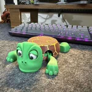 Sous-verre tortue amusant et créatif en plastique, tapis isolant thermique avec membres étonnants et jouet à presser - Product Image 3