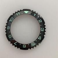 Montre 007 38 mm à double fuseau horaire noire avec insert de lunette en céramique luminescent vert et fonction inclinée