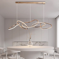 Lustre suspendu LED moderne et artistique, finition acier inoxydable minimaliste, hauteur réglable, doré, pour salon