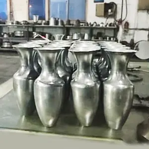 Piezas giratorias de acero inoxidable, florero de botella giratoria de cobre y aluminio de alta calidad
