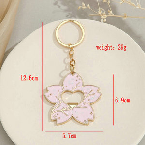 Clés de voiture Fleur de cerisier mignonne Porte-clés ouvre-bouteille drôle Rose Sakura Sac à dos Porte-monnaie Charms Sac à main Pendentif Porte-clés - Product Image 3