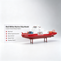 Maquette de navire maritime rouge et blanc