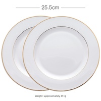 Assiettes, bols, tasses et soucoupes classiques en porcelaine blanche écologique à bord doré pour restaurants
