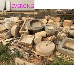 Muelas de granito antiguas/piedra de molino usada
