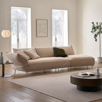 Grand canapé moderne italien en tissu pour villa d'hôtel Forme spéciale de SPARKLE Style crème minimaliste Salon en tissu à pieds hauts