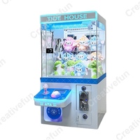 Usine directe Mini poupée grue griffe Machine dessus de Table jouet d'arcade à jetons pour un usage domestique
