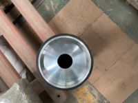 Rouleau porteur pour pièces d'équipement de manutention de convoyeur à bande