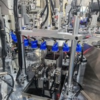 Machine d'assemblage de pompes à lotion NBTY, équipement de pressage de bouchons en plastique contrôlé par PLC, test de tenue, emballage cosmétique, garantie 1 an