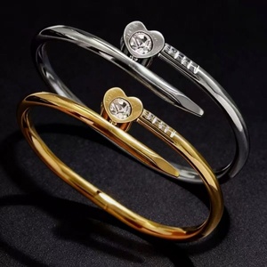 Bracelet en acier inoxydable plaqué or 18 carats pour femme, avec zircone cubique, idéal pour mariage, vente en gros - Product Image 1