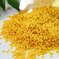 Vente en gros de cire d'abeille en vrac cire de rouge à lèvres de qualité alimentaire jaune blanc granules bouteille de cire de rouge à lèvres bonbon capsule molle matière première authentique